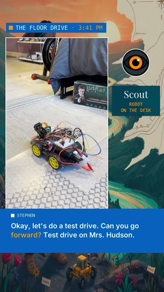 Mrs. Hudson, a small robot with yellow wheels, on the carpet